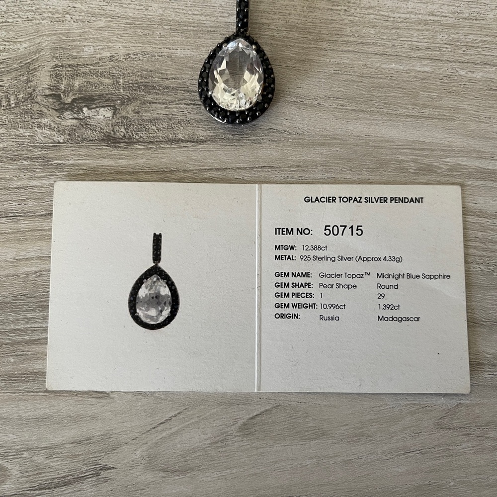 Elegant Topaz Blue Sapphire and Silver Teardrop Pendant - Picture 2 of 5